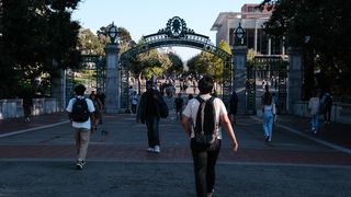 Students pass through Sather Gate on the University of California, Berkeley campus in Berkeley, California, US, on Tuesday, Aug. 30, 2022.